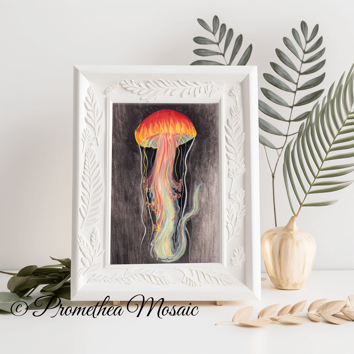 Framed art print of a neon jellyfish with tropical decorative leaves and a vase on a light background