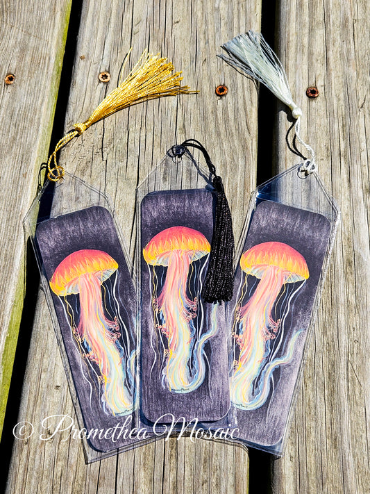 Assorted colored tassels on jellyfish bookmarks printed on eco-friendly recycled cardstock paper