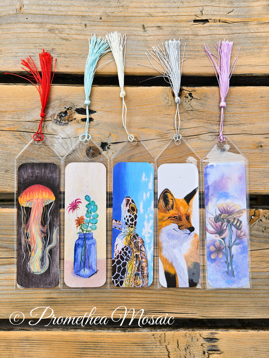 Set of 5 eco-friendly bookmarks featuring art of a neon jellyfish with black background, a blue vase holding wildflowers, a sea turtle swimming peacefully, a thoughtful orange fox, and a patient honeybee on flowers.