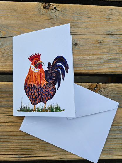 Blank greeting card with blue and orange handsome rooster with white envelope.