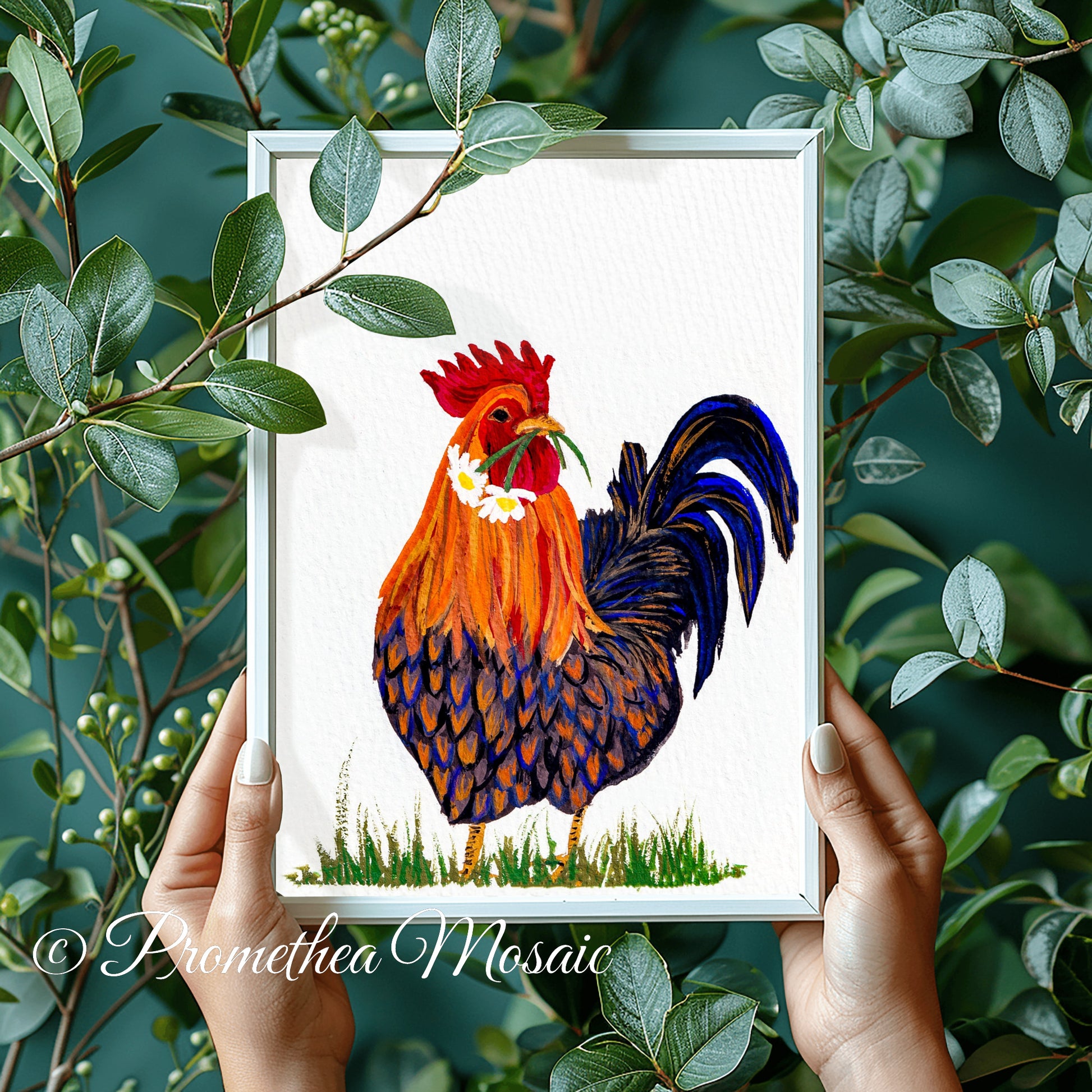 Framed artwork of a colorful rooster held by hands with green leaves in the background
