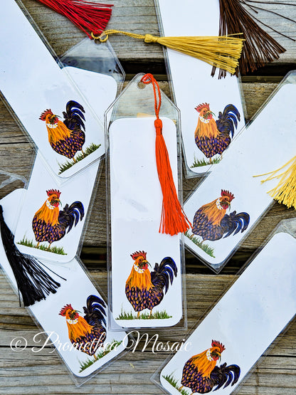 Bookmarks with rooster designs and tassels on a wooden surface, featuring the brand 'Promethia Mosaic'.
