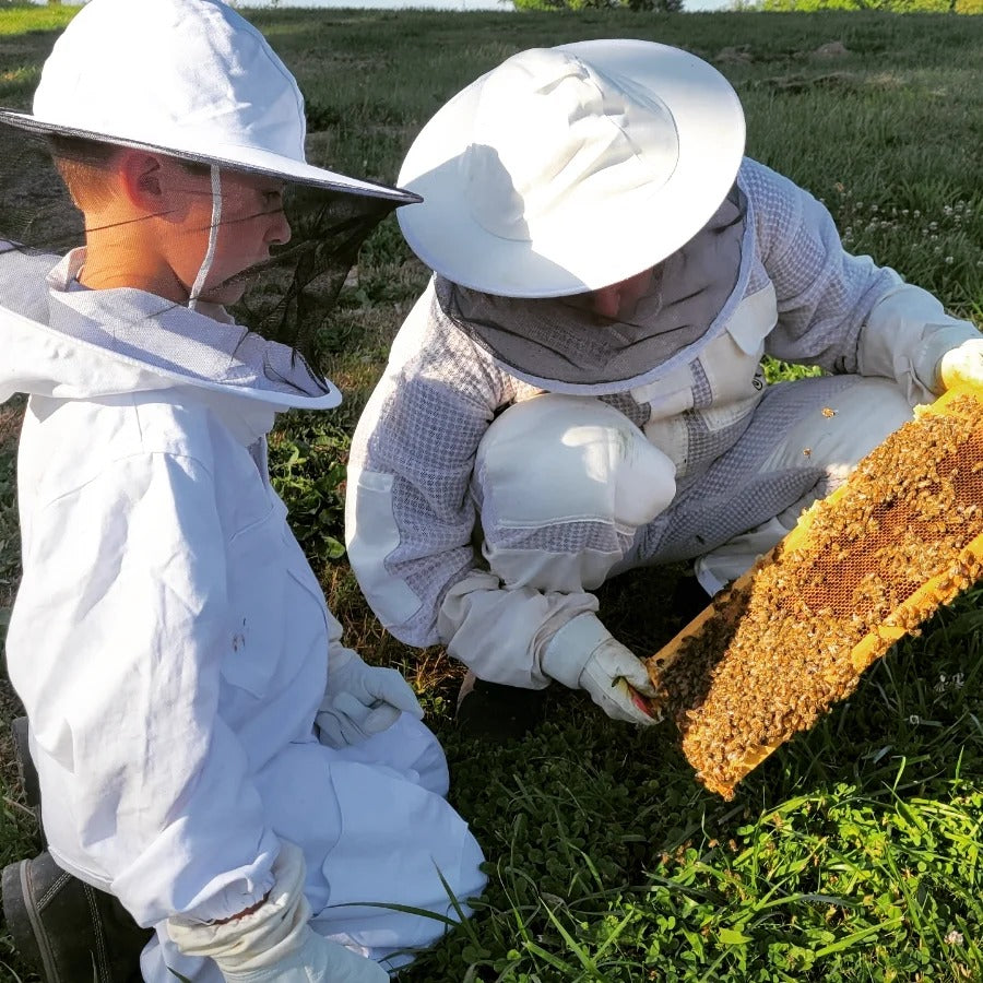Shannon and John beekeeping together